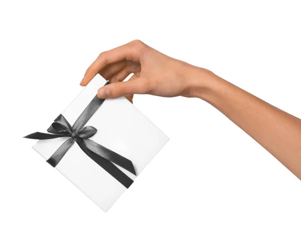 Woman Hand holding Holiday Present White Box with Grey Ribbon — Stock Photo, Image