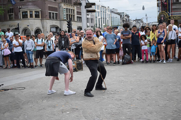 Street artist locked in chain in Amsterdam