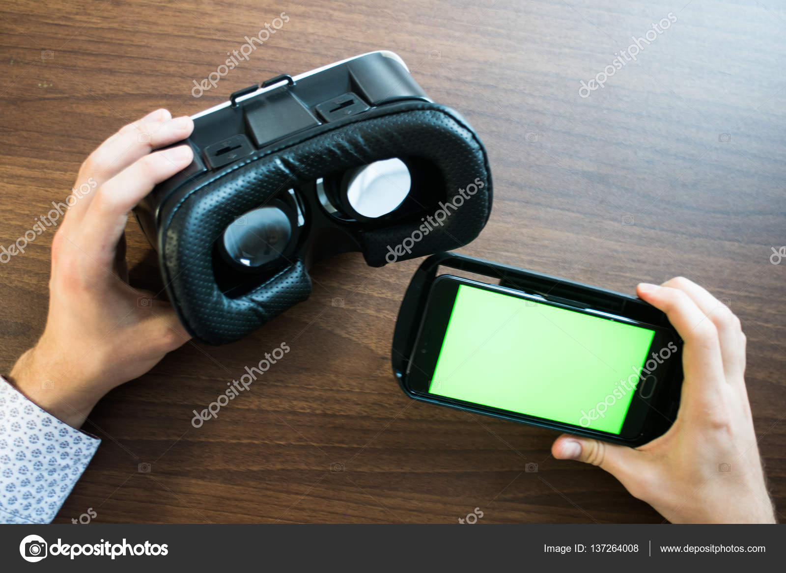 Virtual reality, VR, helmet and smartphone with green screen for key