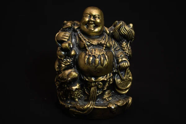 Chinese figurine Hotei, the laughing Buddha is a symbol of prosperity