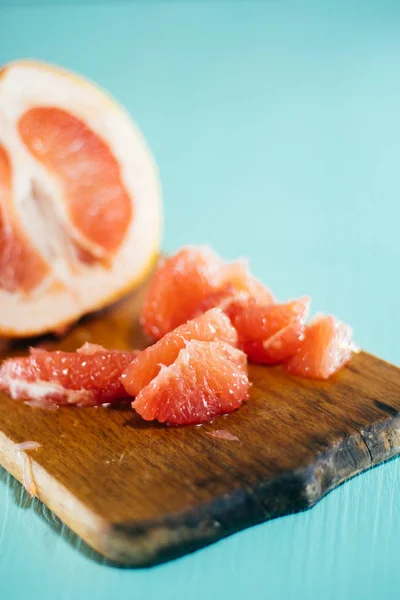 Vintage photo of grapefruits on wood table — Stock Photo, Image