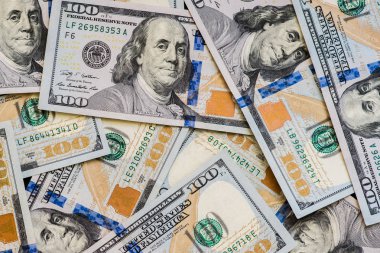 Çok sayıda yeni 100 dolarlık banknotlar yüz ABD parçalandı. İçin arka plan ve kopya alanı