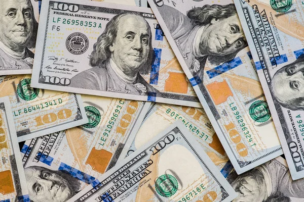 Çok sayıda yeni 100 dolarlık banknotlar yüz ABD parçalandı. İçin arka plan ve kopya alanı