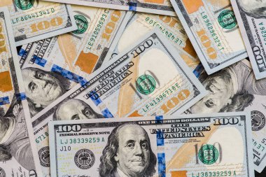 Çok sayıda yeni 100 dolarlık banknotlar yüz ABD parçalandı. İçin arka plan ve kopya alanı