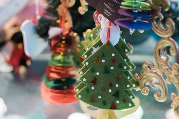 New Year's toys and spruce branches on a wooden background close-up — Stock Photo, Image