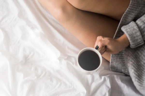 Top view morning coffee cappuccino art with heart in bed wool blanket and empty space pages in a magazine with Good morning writing copy space top view White light tinting — Stock Photo, Image