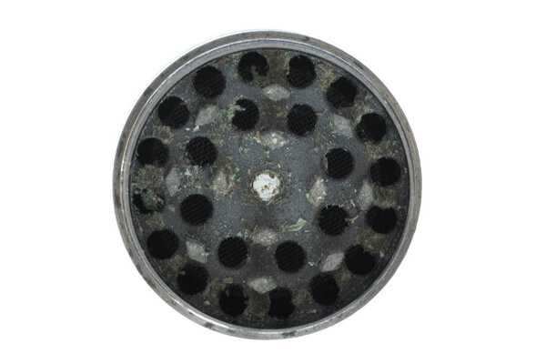 isolated part of Metallic gray grinder for buds of marijuana isolated