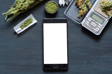 Smartphone için hroma anahtar beyaz ekran, chromakey karşı marihuana yasallaştırma kavramı ve tıbbi amaçlar için esrar kullanımı ile