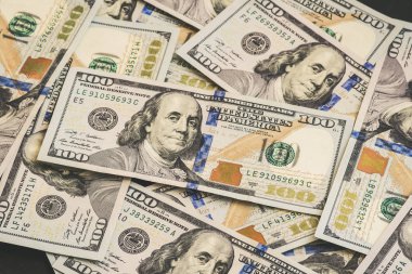 Çok sayıda yeni 100 dolarlık banknotlar yüz ABD parçalandı. İçin arka plan ve kopya alanı