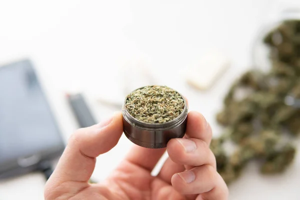 Grinder Fresh Weed Hand Cannabis Buds White Table Joint Marijuana — Stock Photo, Image