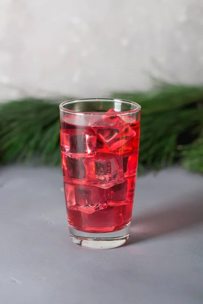 Glass of mango dragonfruit refresher drink on table with ice cubes. Copy space. — Stock Photo, Image