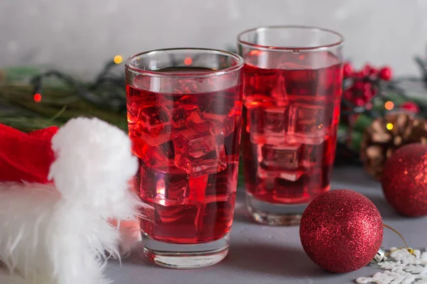 Glass of mango dragonfruit refresher drink on table with ice cubes. Copy space. — 스톡 사진