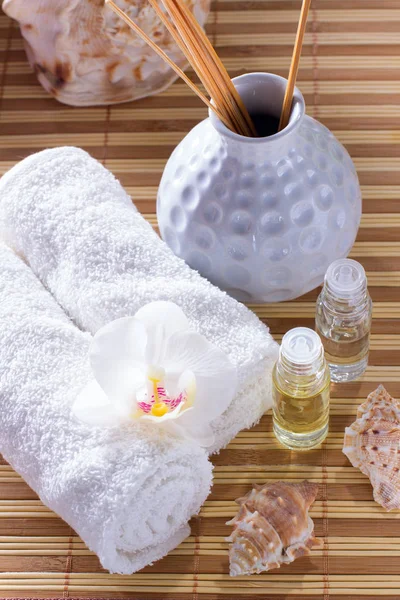 Spa Setting Towel Shells Aromatic Oil Orchid Candle Relax Concept — Stock Photo, Image