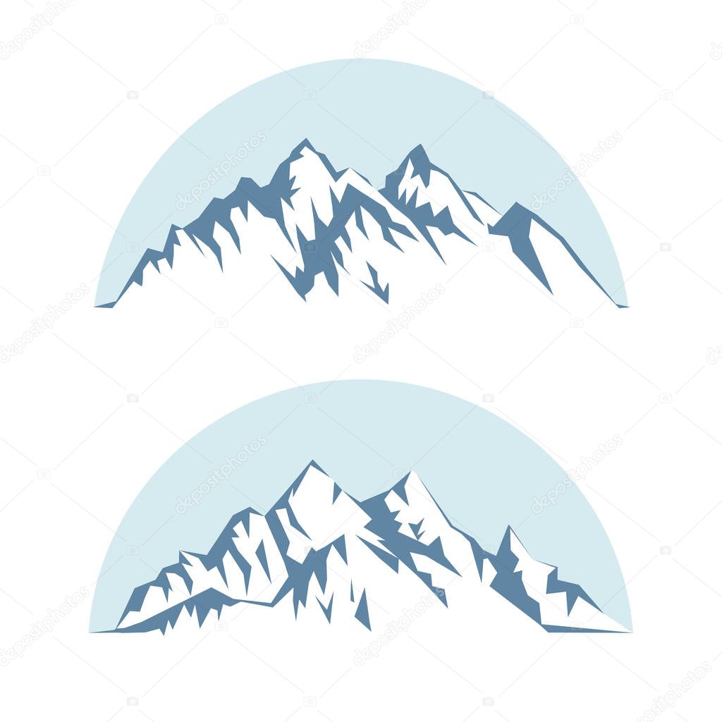 graphic silhouette of the mountains against the blue sky