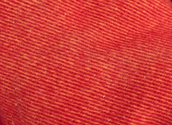 Фонова текстура вовняної ковдри помаранчевого та фіолетового кольорів . — стокове фото
