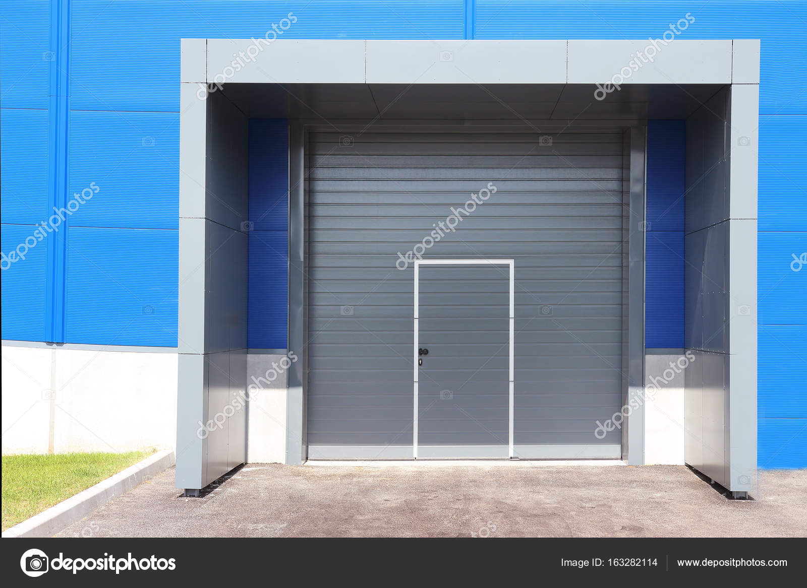 Roller Shutter Door Of Logistic Center For Industrial Background