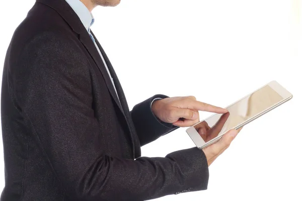 Man in zakelijke pak klikken op Tablet PC-scherm geïsoleerd op witte achtergrond. — Stockfoto