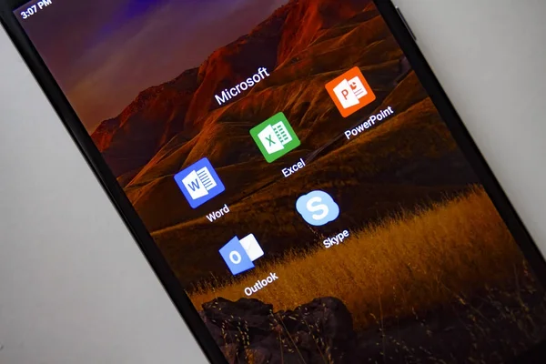 Berlin, Germany - November 19, 2017: Microsoft apps on screen modern smartphone. Word, Exel, PowerPoint, Outlook, Skype application icon on display. Microsoft office — Stock Photo, Image