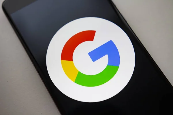 Berlin, Germany - November 19, 2017: Google logo icon on screen modern smartphone — Stock Photo, Image