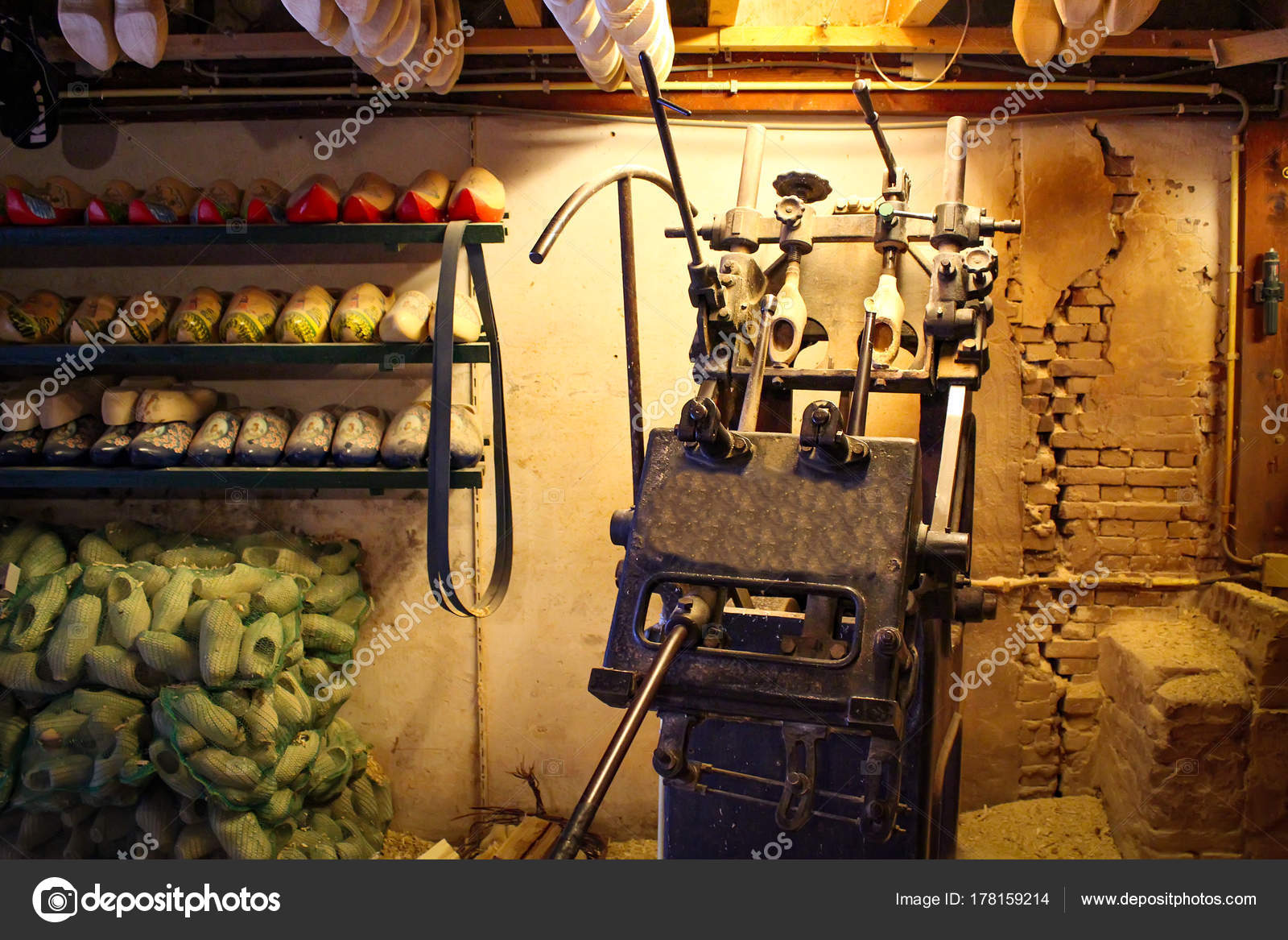 Machine for manufacturing wooden shoes Klompen in Holland. National