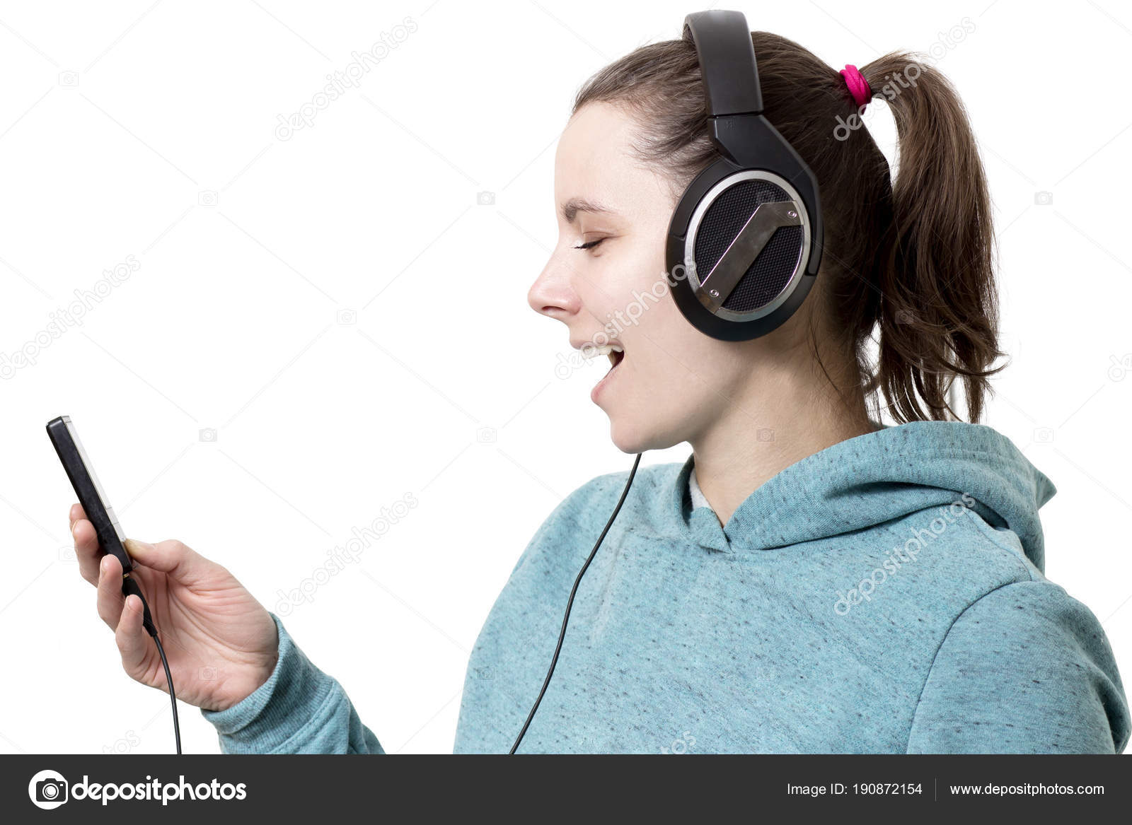 Jeune Fille Au Casque Avec Lecteur En Mains écouter De La Musique