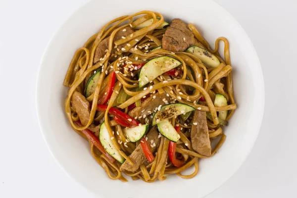 Fried noodles with beef and zucchini — Stock Photo, Image