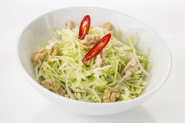 Cabbage salad with walnuts — Stock Photo, Image