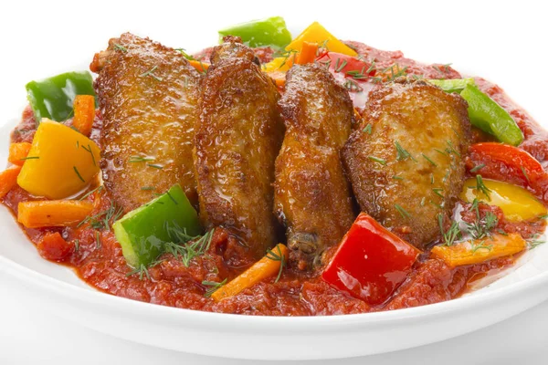 Spicy chicken wings with veg sauce