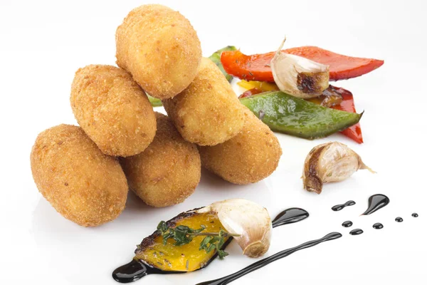 Patatas bravas (fried potato fingers)