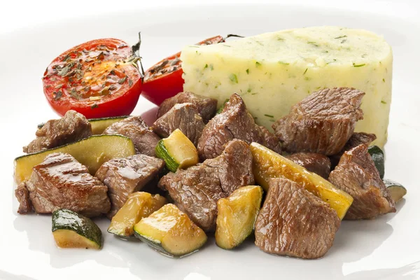 Kızarmış biftek kabak ve patates püresi ile — Stok fotoğraf