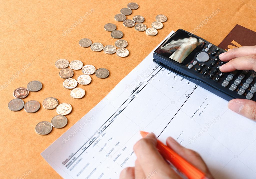 Close up of man with calculator counting making notes at home, c