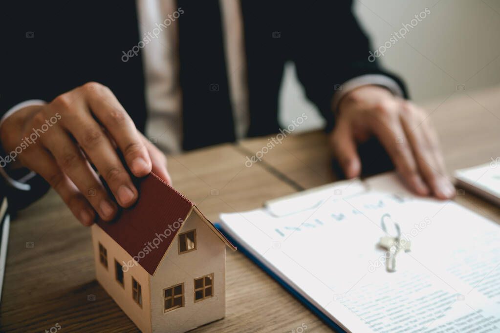 Real estate agent discussion about signing on paper financial co