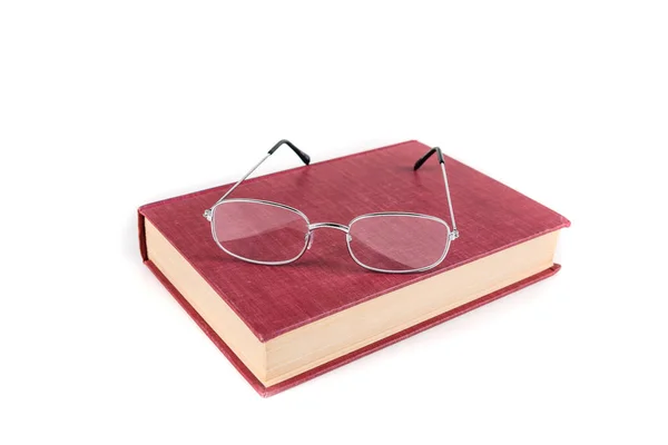 Book with reading glasses — Stock Photo, Image