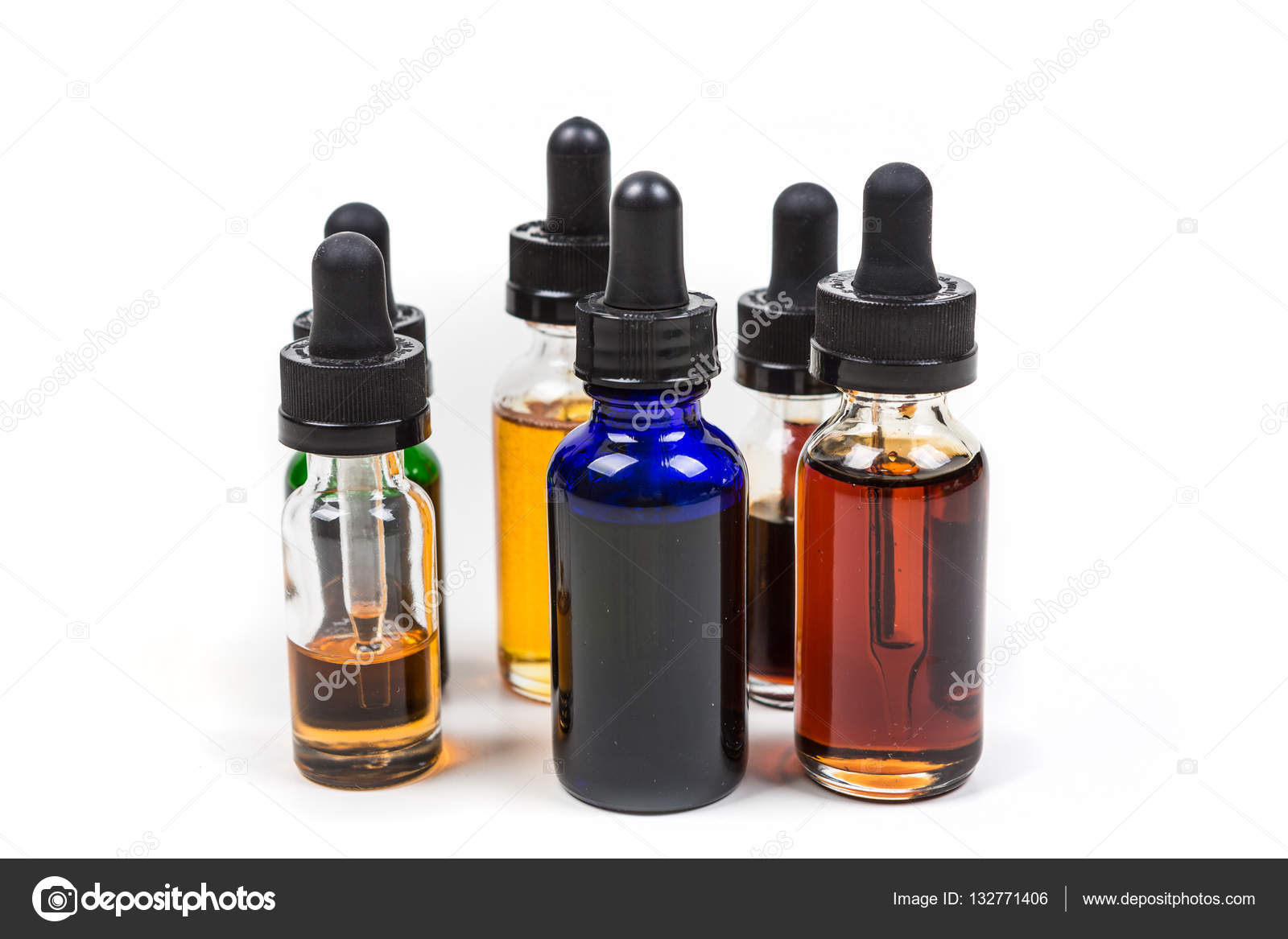 Assorted flavors of vape juice — Stock Photo © Ecummings00 132771406