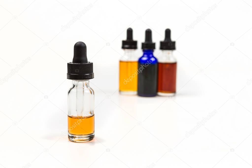 Flavored vape juice with shallow depth of field and objects out of focus