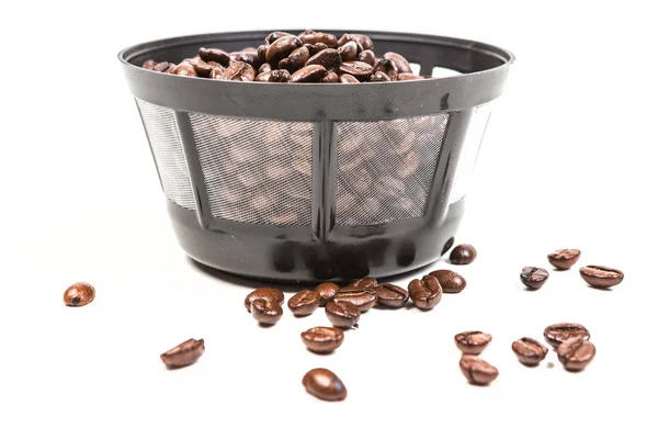 Reusable coffee filter filled with beans — Stock Photo, Image