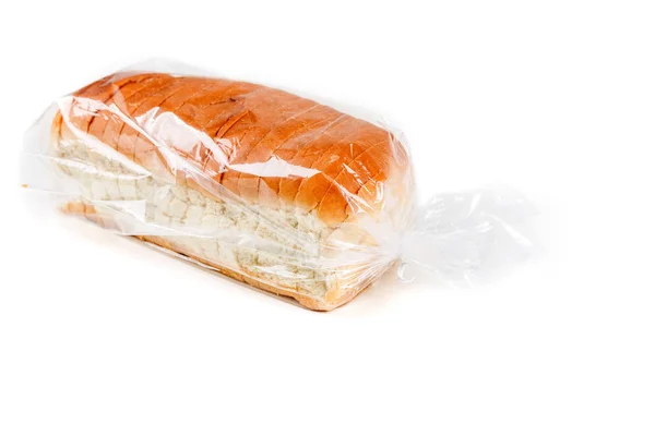 Целая буханка хлеба в пакете — стоковое фото