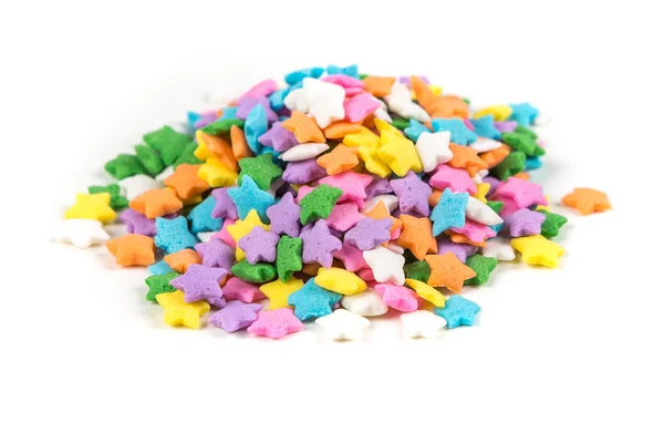 Star shaped assorted rainbow colored sprinkles — Stock Photo, Image