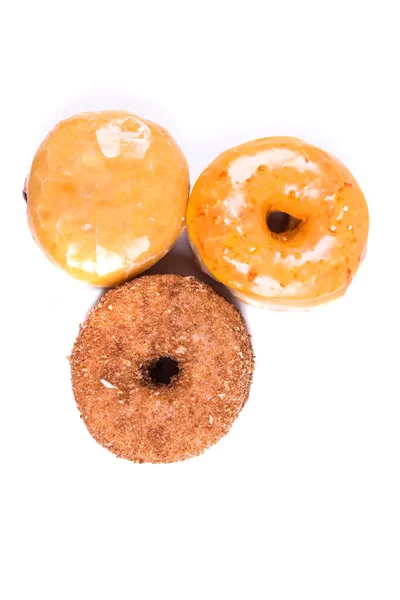Assorted glazed and frosted donuts — Stock Photo, Image