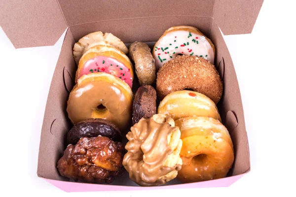 Una docena de rosquillas en una caja — Foto de Stock