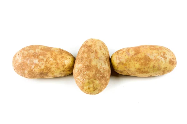 Drie aardappelen geïsoleerd — Stockfoto