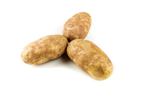 Три картошки изолированы — стоковое фото