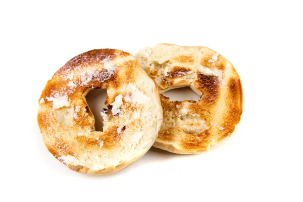 Plain white toasted buttered bagels — Stock Photo, Image