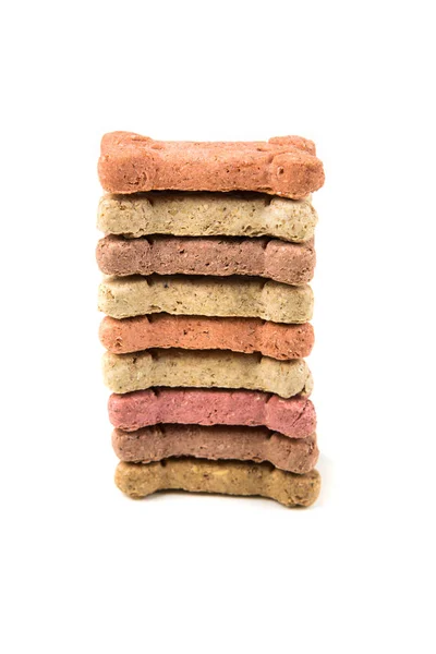 Pilha de biscoitos de cão multicoloridos — Fotografia de Stock