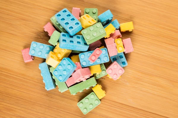 Pile of multicolored candy building blocks — Stock Photo, Image