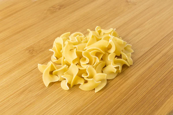 Pile Many Yellow Dehydrated Uncooked Egg Noodles — Stock Photo, Image