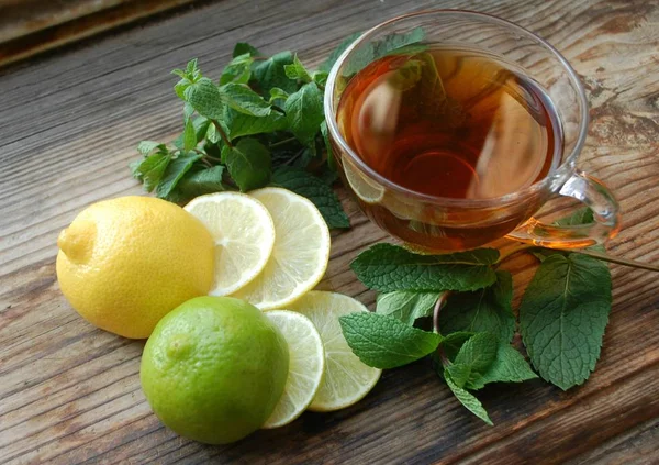 Cup Tea Mint Lemon Lime Wooden Brown Background — Stock Photo, Image