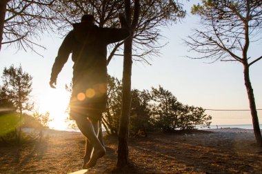 Slackline in backlight