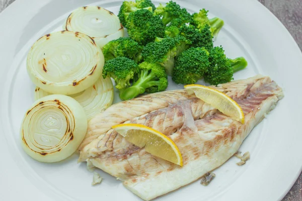 Steamed snapper with broccoli and grilled onions