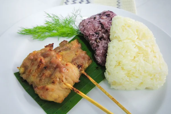 Grilled pork and sticky rice — Stock Photo, Image